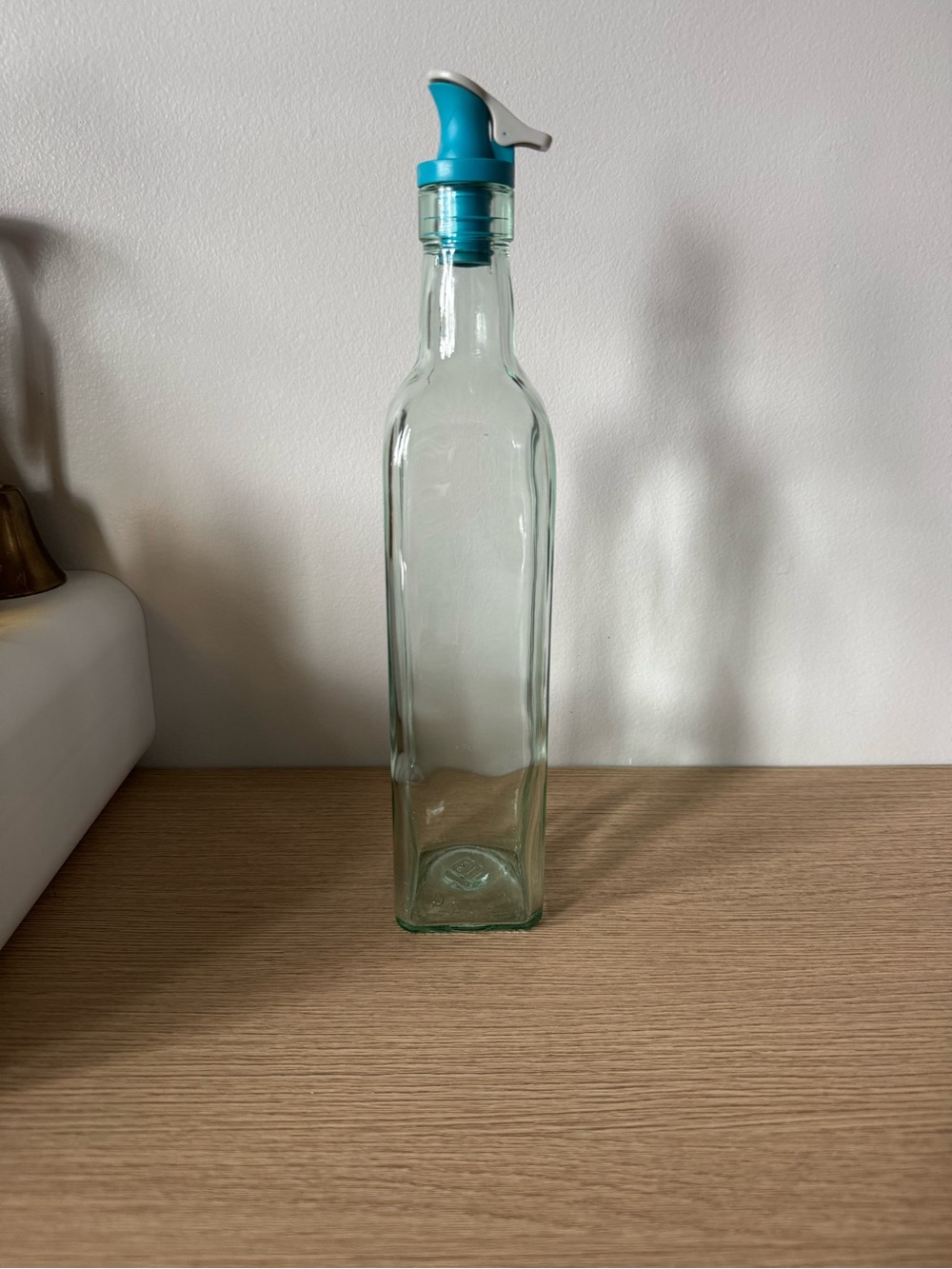 Light Green Glass Oil Bottle with Blue Pour Spout
